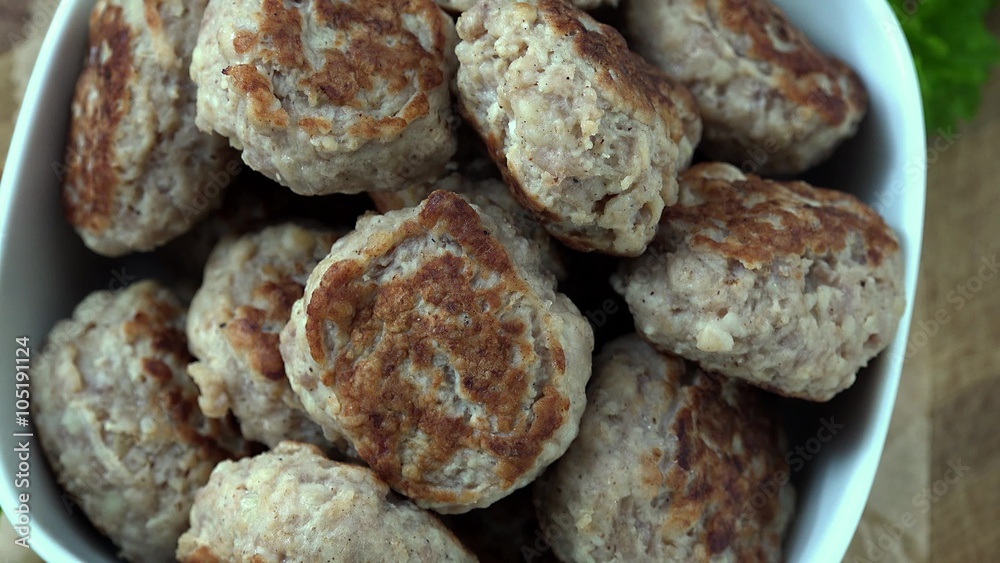 Portion of rotating Mini Burgers (seamless loopable 4K UHD footage) Portion of rotating Mini Burgers (seamless loopable 4K UHD footage)