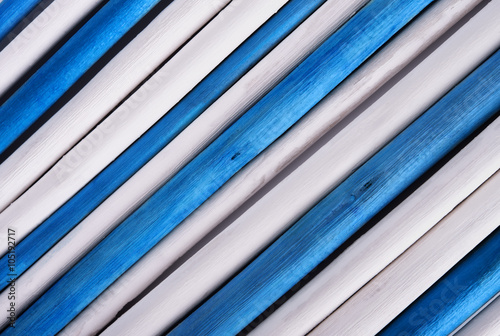 Wooden background from painted twigs