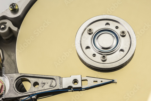 Open computer hard drive on white background photo