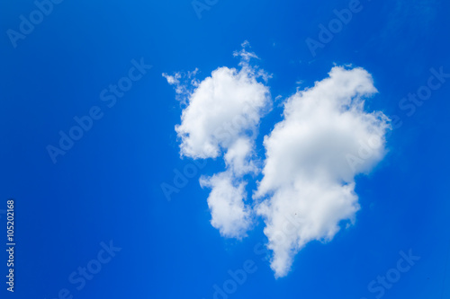 Clouds like broken heart on blue-sky