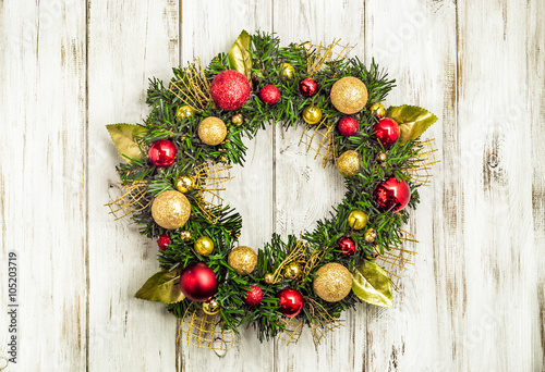 Christmas wreath with baubles useful as christmas decoration. photo