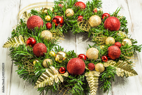 Christmas wreath with baubles useful as christmas decoration.
