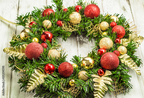 Christmas wreath with baubles useful as christmas decoration.