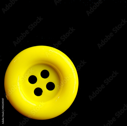 Button isolated on black background.