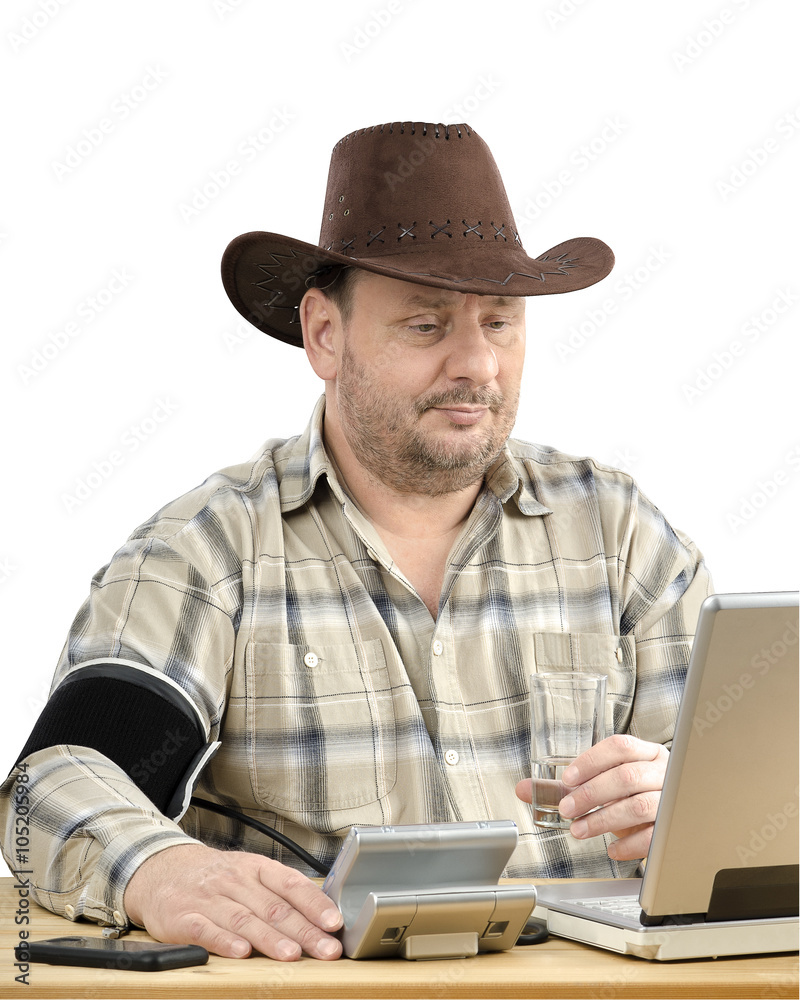 Farmer measures blood pressure during virtual doctor visit Farmer measures blood pressure during virtual doctor visit