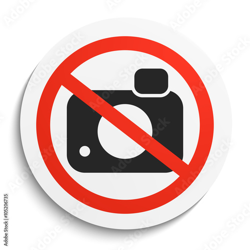 No Photos Sign on White Round Plate
