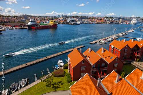 Cityscape of Stavanger, Norway under blue cloudy sky.