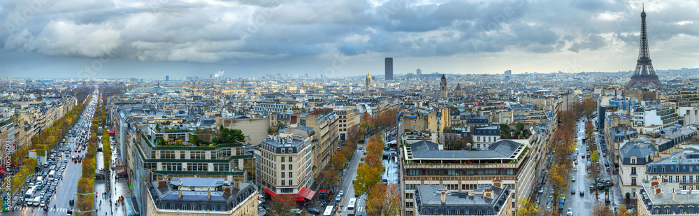 Panoramic view of Paris from the Arc de Triomphe. Autumn. Rain. Sun.