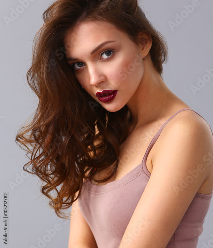 Portrait of beautiful woman , isolated on gray background