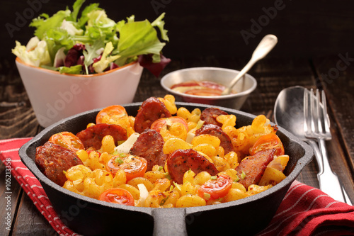 Casserole with chorizo sausage in a frying pan