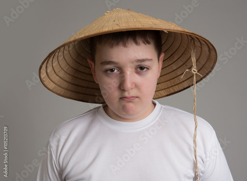 Teen boy in hat