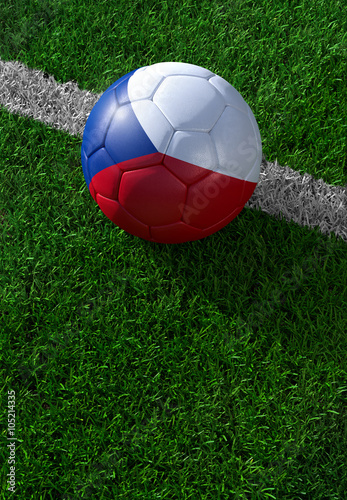 Soccer ball and national flag of Czech Republic, green grass
