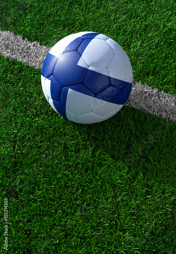 Soccer ball and national flag of Finland   green grass