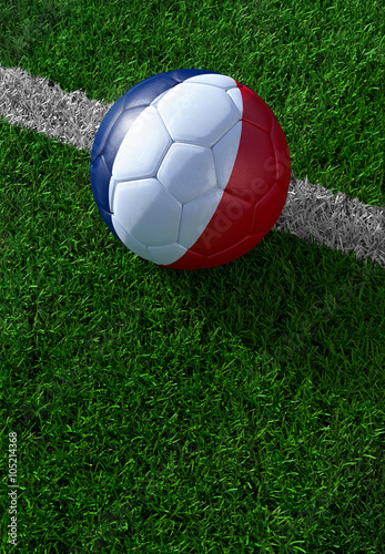 Soccer ball and national flag of France   green grass