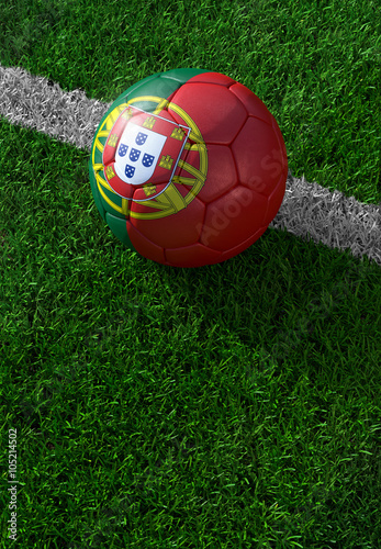 Soccer ball and national flag of Portugal   green grass