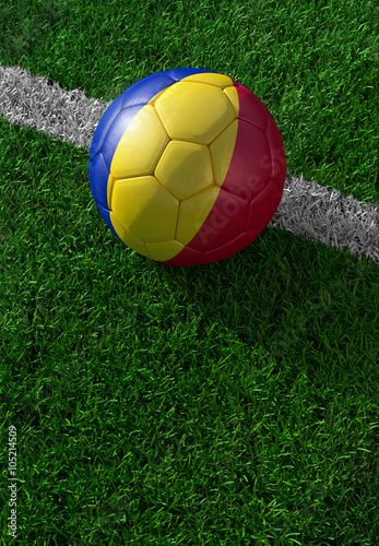 Soccer ball and national flag of Romania   green grass