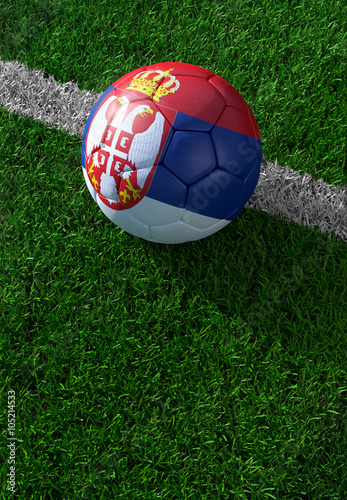 Soccer ball and national flag of Serbia   green grass