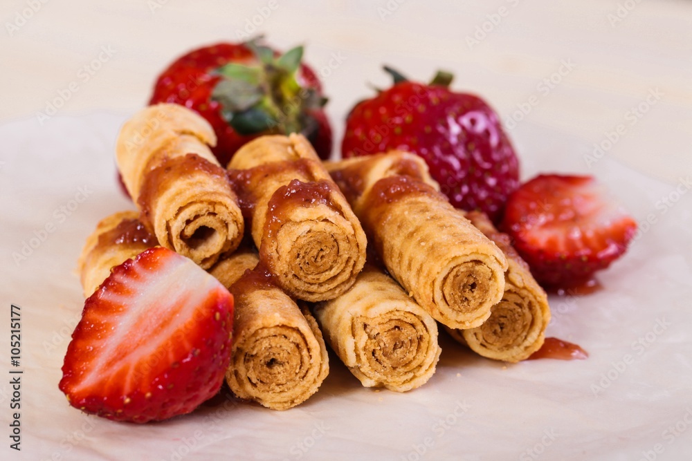 Waffle rolls with strawberry jam