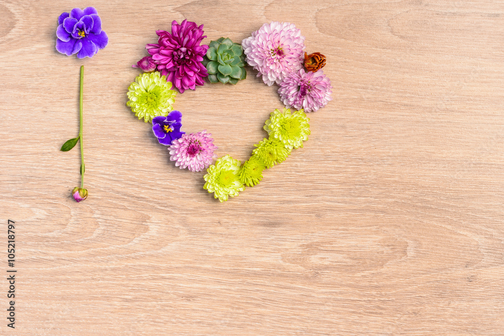 Flowers on wooden table Flowers on wooden table
