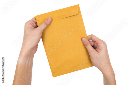 Hands holding envelope with document  isolated on white backgroud © ronnarong