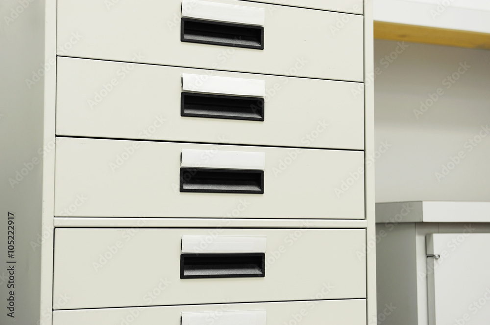 close up on the cabinet drawers in office close up on the cabinet drawers in office