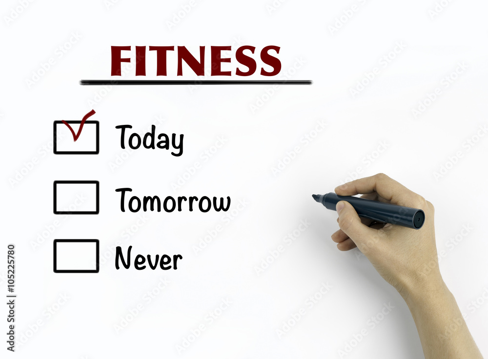Hand with marker writing Fitnes concept Hand with marker writing Fitnes concept