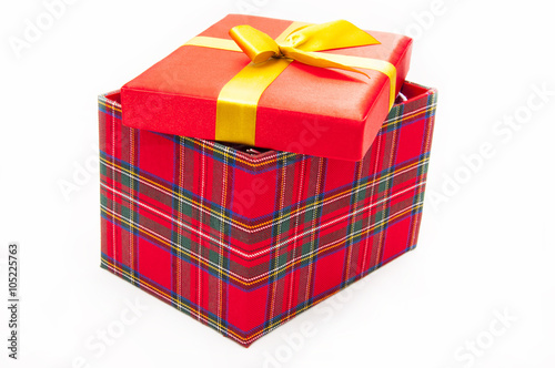 Gift/Red box with lid ajar , on a white background