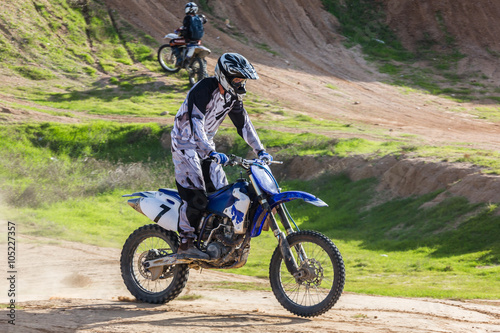 racer on a motorcycle in the desert