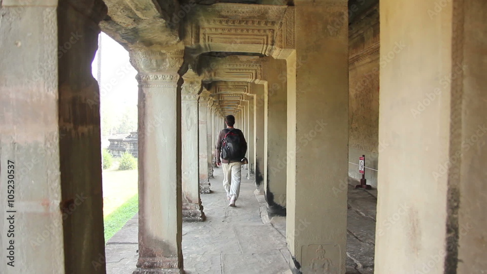 Man Walking Inside Angkor Wat Man Walking Inside Angkor Wat