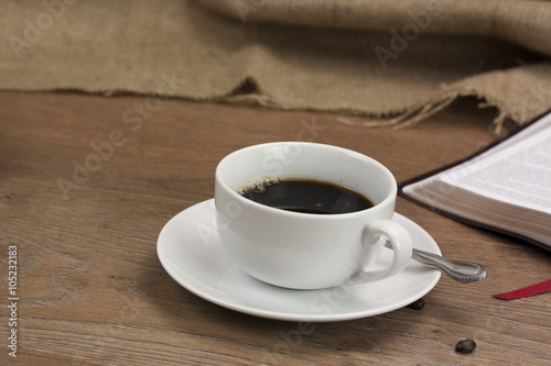 Coffee cup against a rustic background