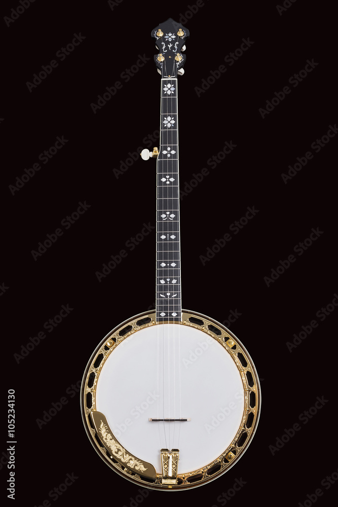 Obraz premium Metalic banjo isolated on black background