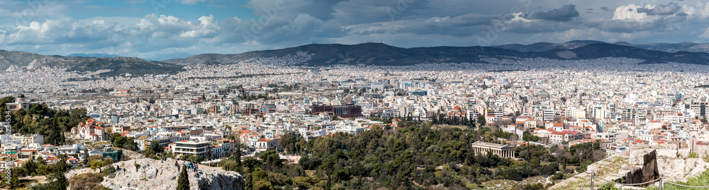 Panoramic Landscape of the ancient city of Athens with blue sky and clouds