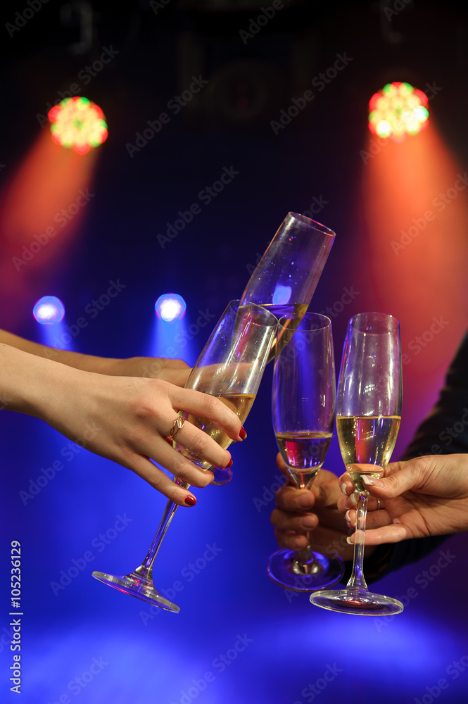 People with champagne in a bar or casino having lots of fun