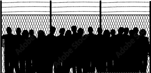 crowd in front of the fence 