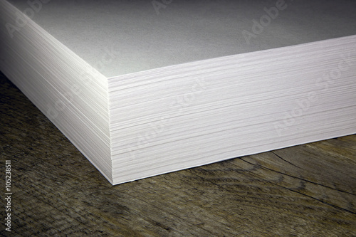a stack of white paper for the printer