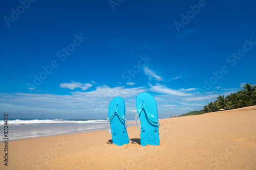 flip flops on a tropical beach