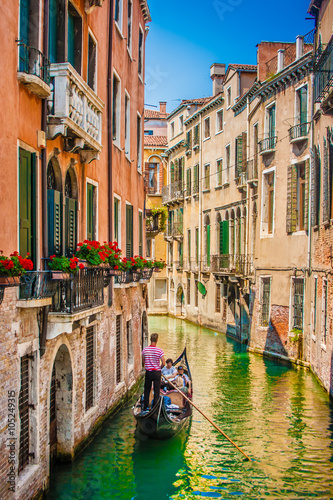 Fotografia, Obraz Traditional Gondola on canal in Venice, Italy