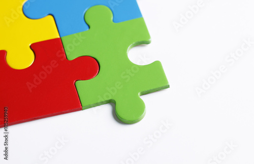Colorful jigsaw puzzles with copy space © heliopix
