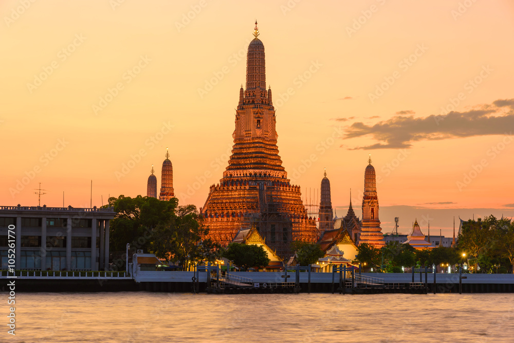 Wat Arun Temple at sunset in Bangkok, Thailand. Location in public area.