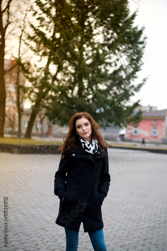 Beautiful girl in the autumn park