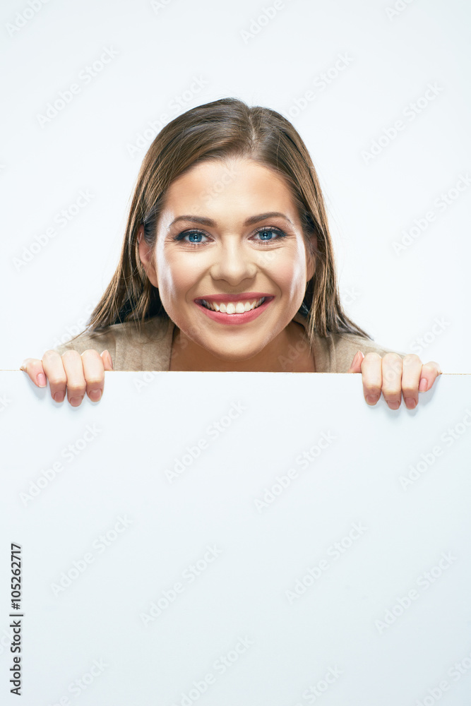 Woman looks out from behind white blank sign board. Woman looks out from behind white blank sign board.