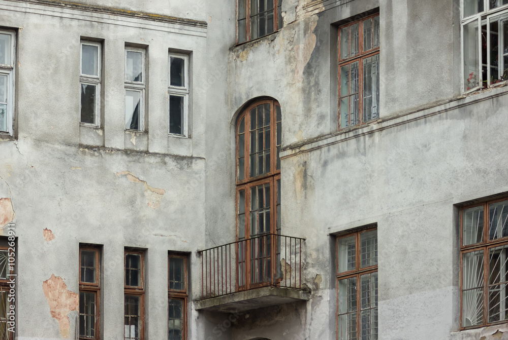 Facade of gloomy old house. Lviv, Ukraine. European travel photo.