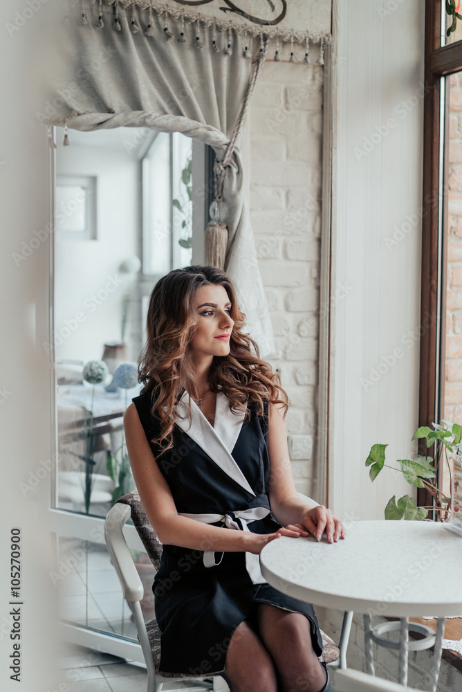 Portrait of business lady in cafe Portrait of business lady in cafe
