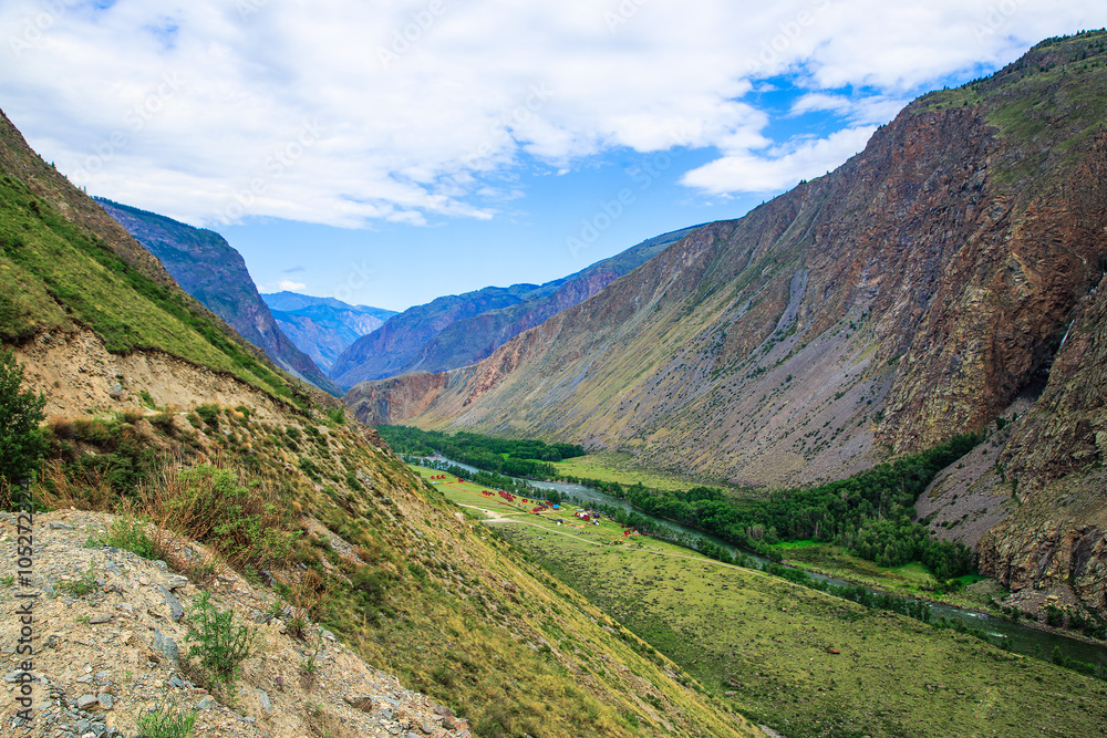 mountain valley in summer day clouds Altai