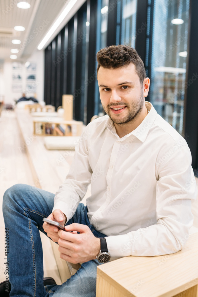 Handsome dusinessman, work,contact, seif-education in office Handsome dusinessman, work,contact, seif-education in office