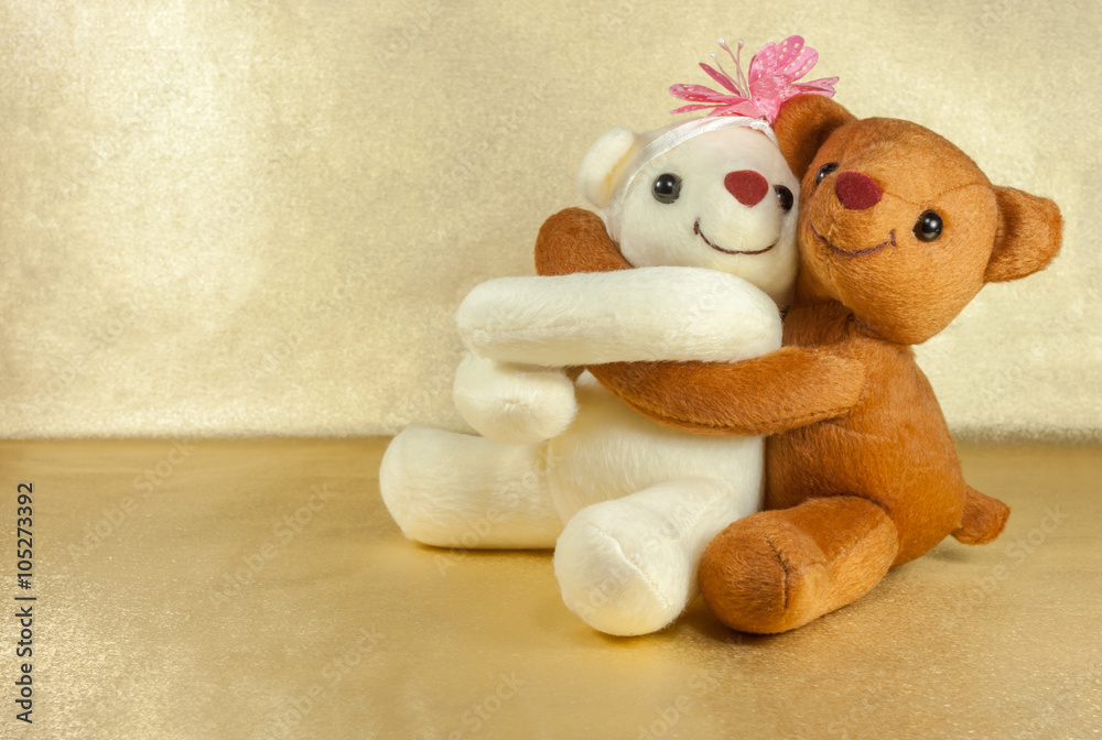 Fototapeta premium lovely teddy bears gold background