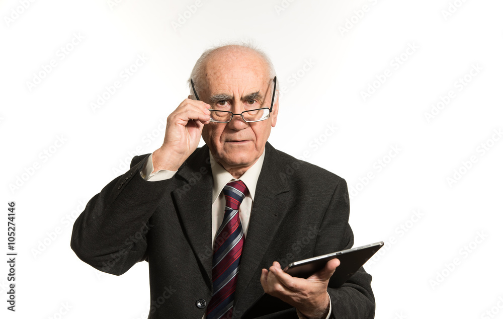 old businessman with tablet computer old businessman with tablet computer