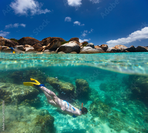 Fototapeta Naklejka Na Ścianę i Meble -  Woman snorkeling at tropical water