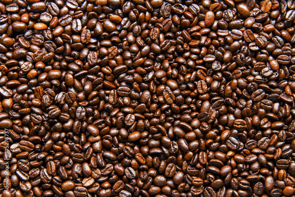 Roasted coffee beans background texture.