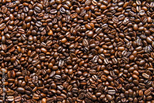 Roasted coffee beans background texture.